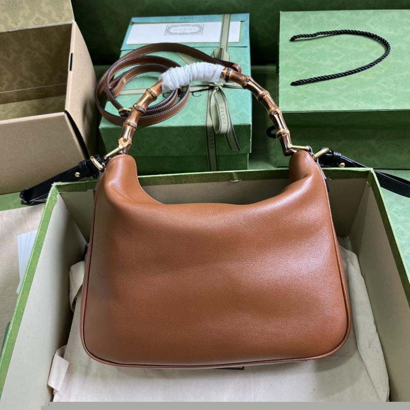G*u*i top handle bags